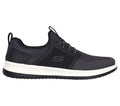 Black sneaker with white sole on a white background