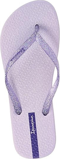 Purple flip-flop sandal with 'Ipanema' logo on a white background